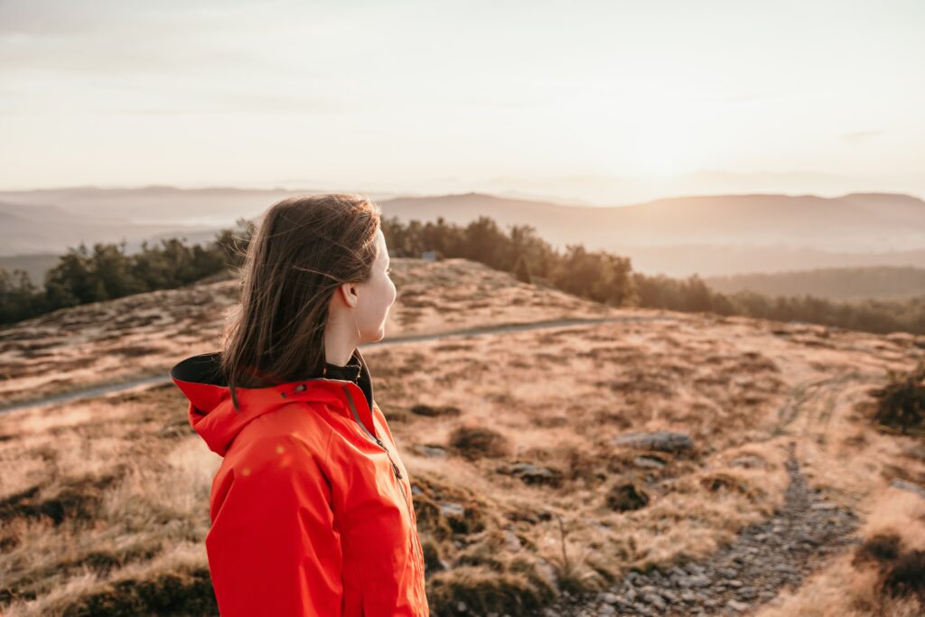 woman looking at the horizon ready to start investing